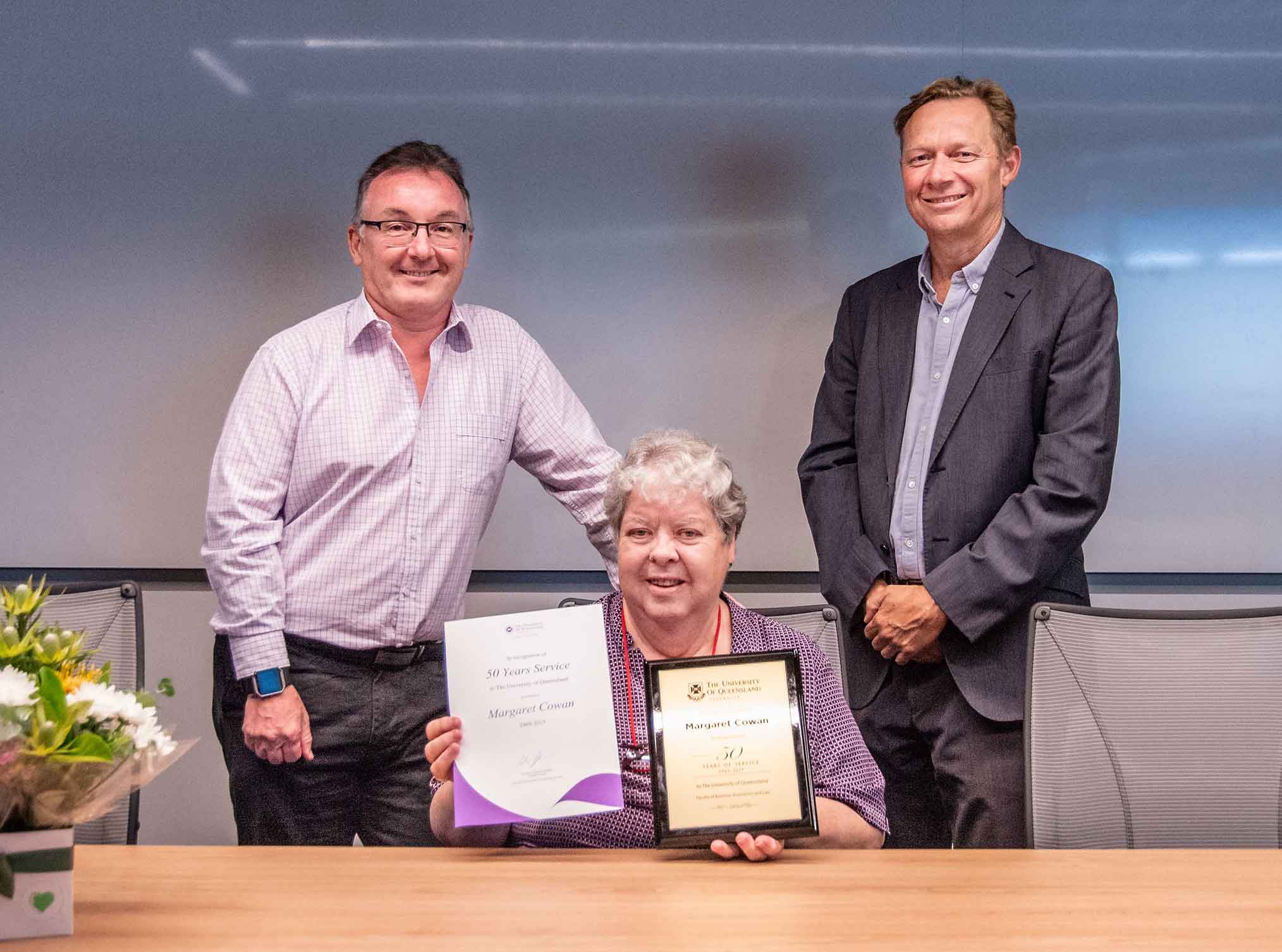 This is an image of Deputy Executive Dean Phil Bodman, award-winner Margaret Cowan, and Executive Dean Professor Andrew Griffiths