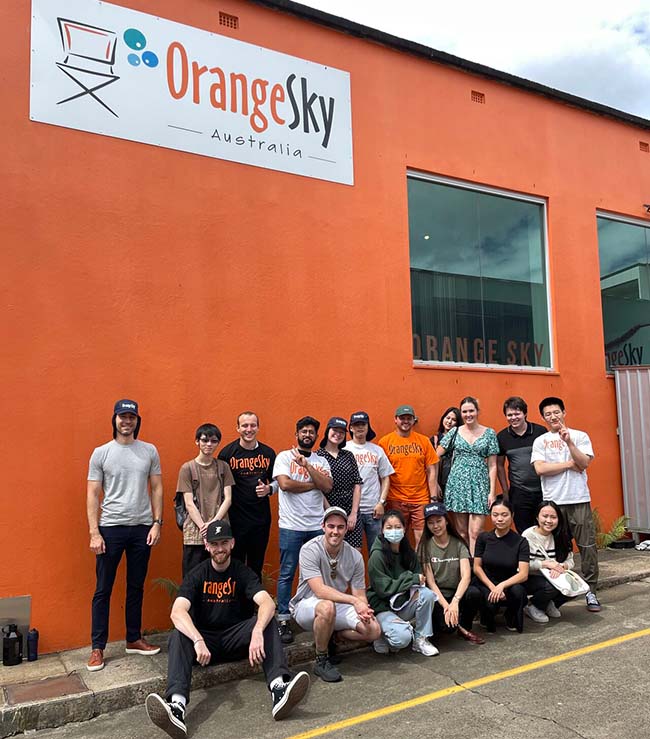 UQ students outside the Orange Sky building in Brisbane.