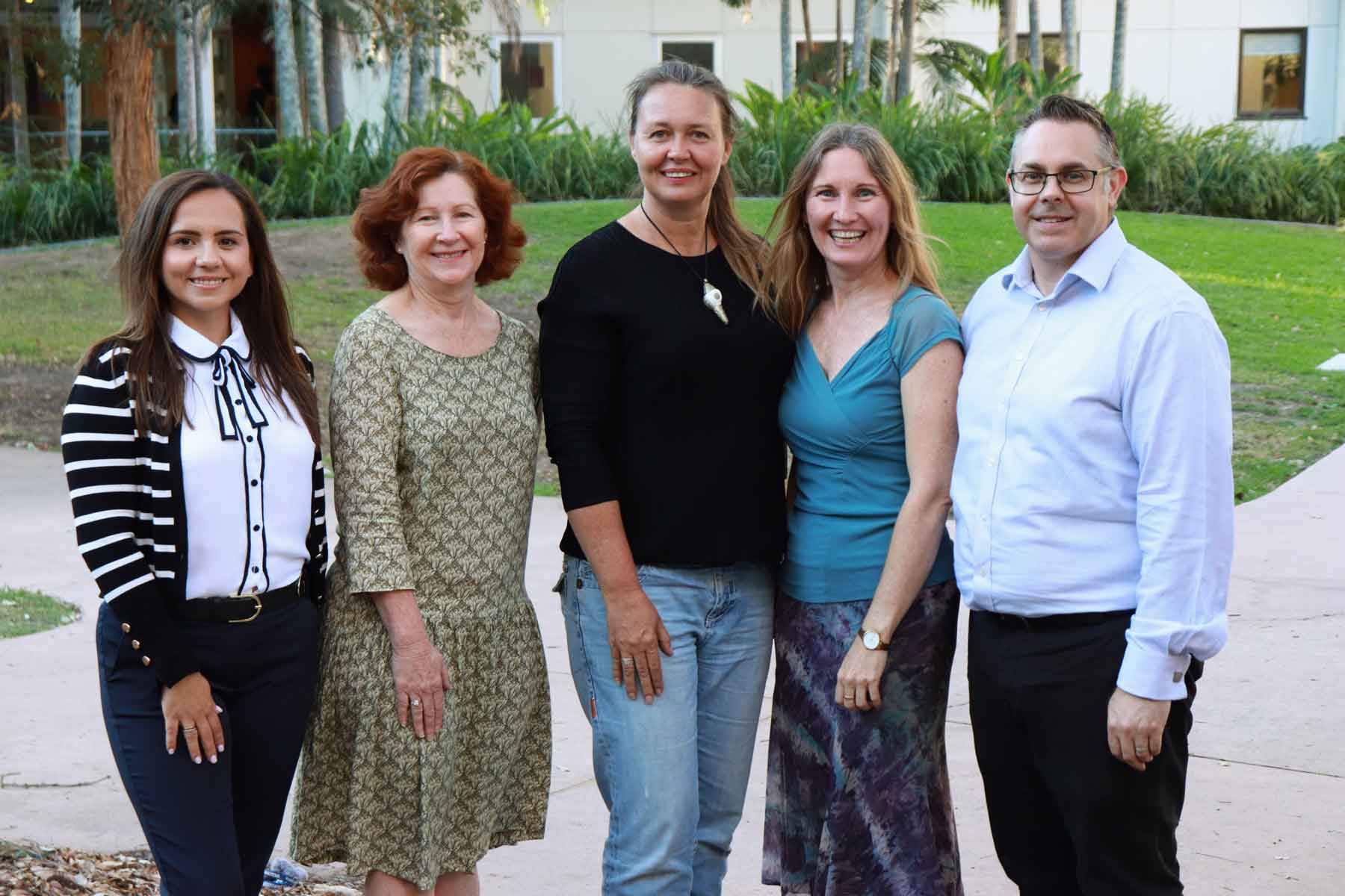 This is an image of two new PhD candidates and Ecotourism Australia scholarship recipients with their advisors