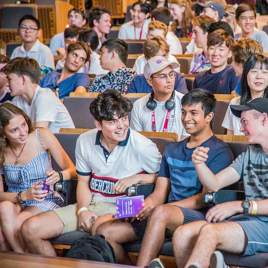 students gathered for an orientation session