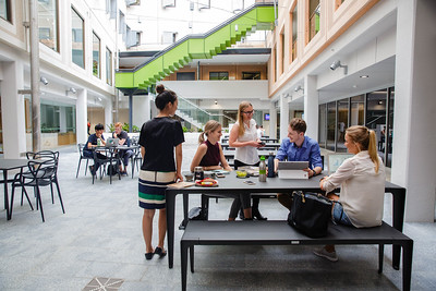 Students at table in Colin Clark Courtyard