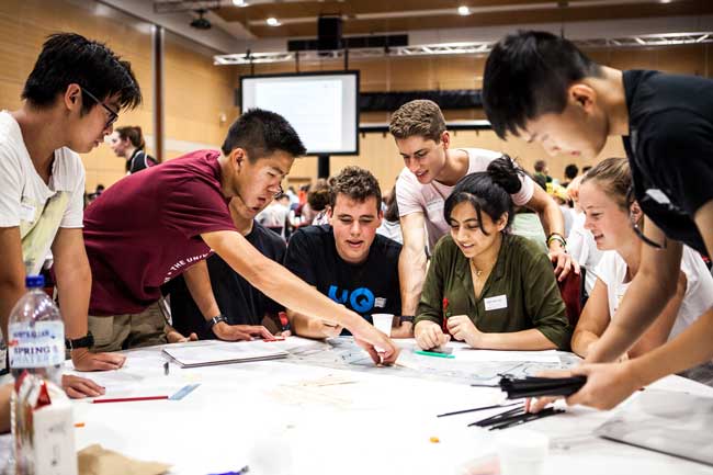 students collaborating in a workshop