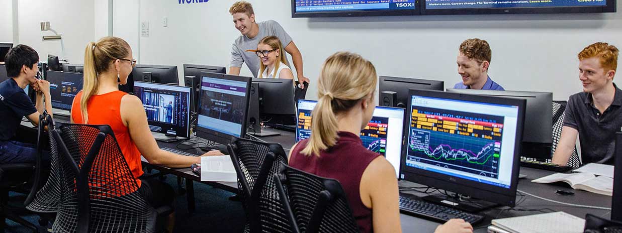 Students in Bloomberg Trading Room in Colin Clark Building