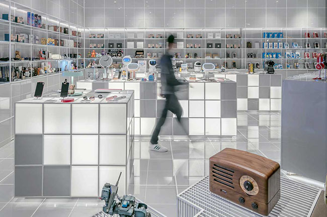 man walking through high-tech department store