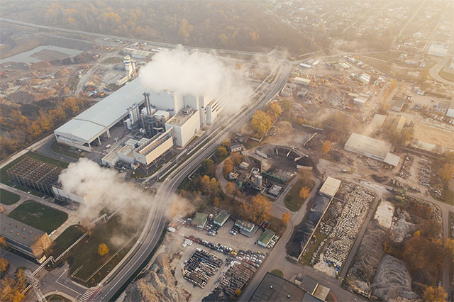 pollution being emitted by an industrial building