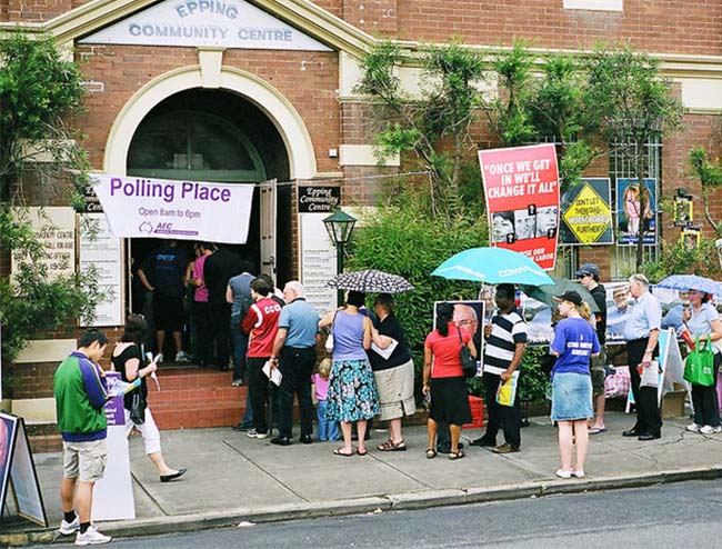 people lining up to cast their vote in an Australian election. 