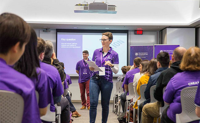 UQ's Angie Knaggs speaking at the CreateAthon event