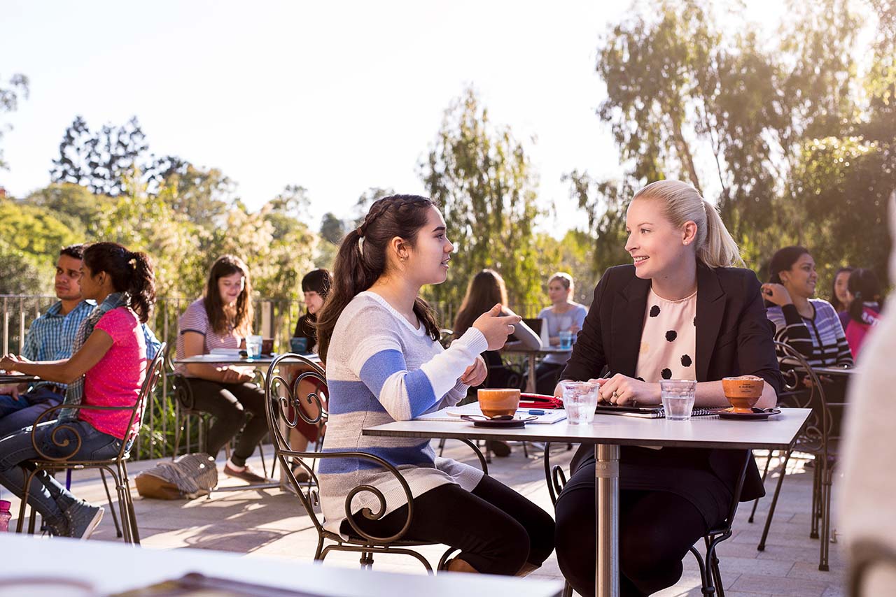 Student sitting with their career mentor