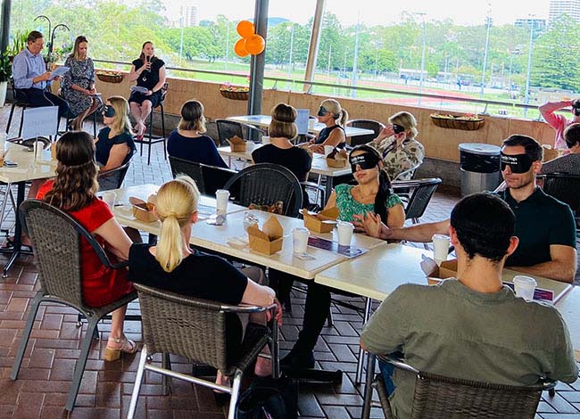 UQ staff at the Rooftop Cafe for International Day of People with a Disability Morning Tea