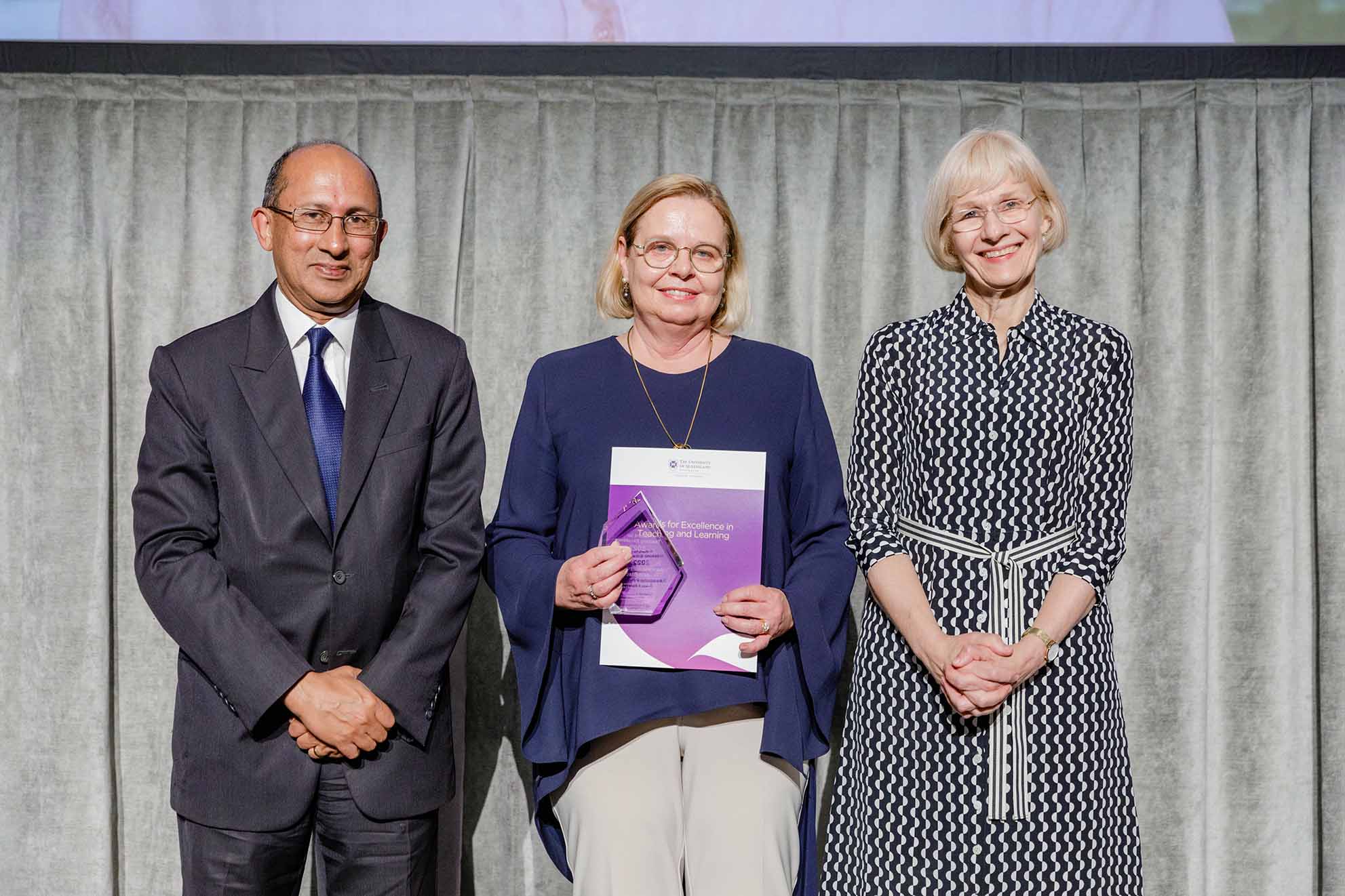 Ann Black winning award for UQ 