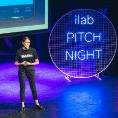 Hailey Brown pitching her app to an audience at iLab Pitch Night.
