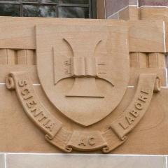 sandstone badge on the Forgan Smith building