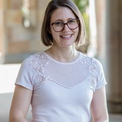 Profile photo of Justine Bell-James standing in UQ's Great Court