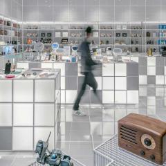 man walking through high-tech department store