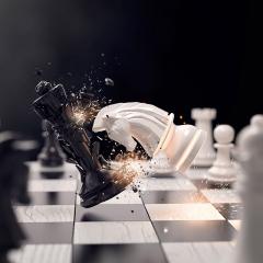 chess pieces clashing