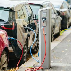 Electric Vehicles charging on the side of the road 